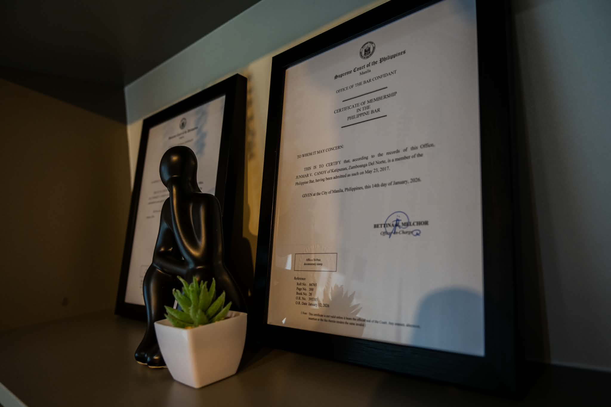 Framed Philippine Bar membership credentials in the CANOY LAW office