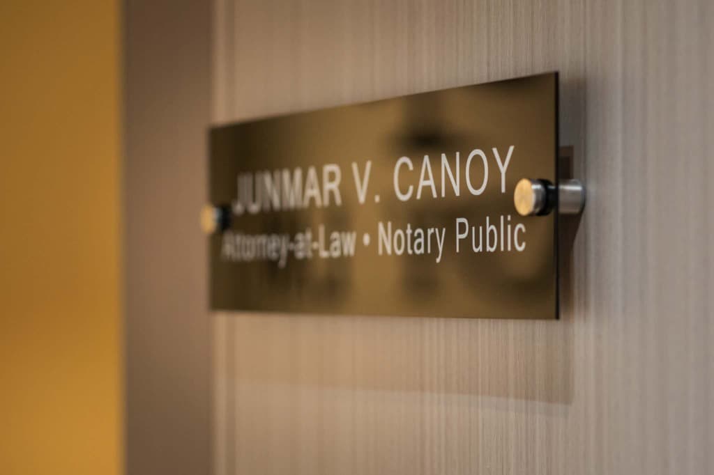 Junmar V. Canoy attorney-at-law nameplate